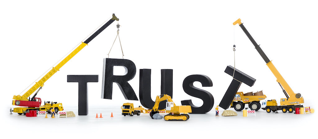 Build up trust: Machines building trust-word. public engagement in courts