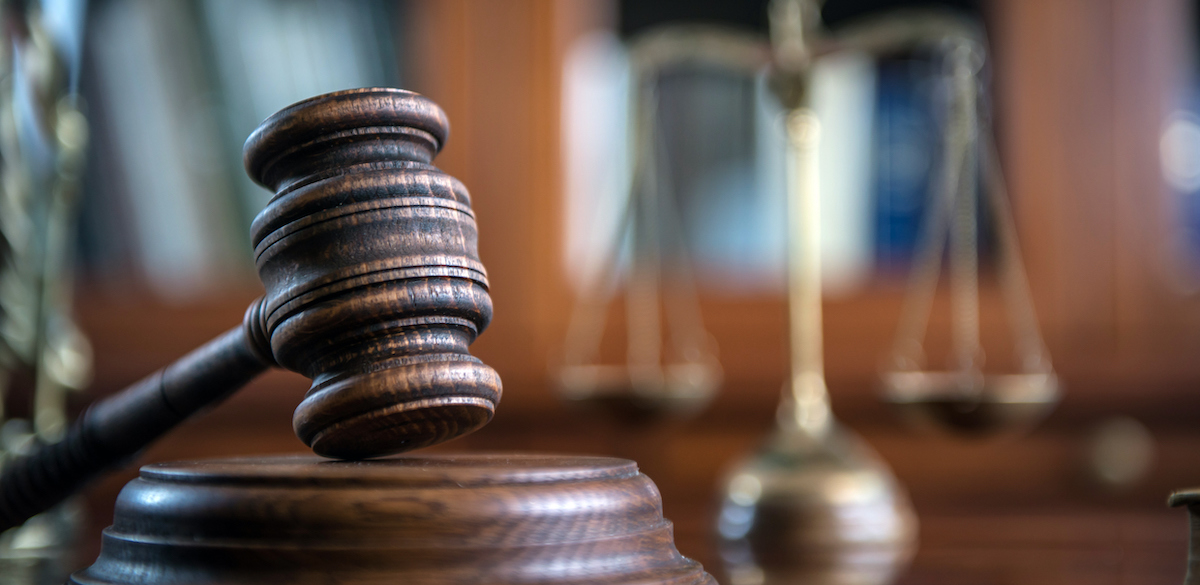 Law and Justice concept. Mallet of the judge, books, scales of justice. trauma-informed judges
