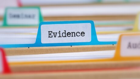 File folders with a tab labeled Evidence Treatment Courts Evidence